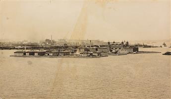 HINE, LEWIS W. (1874-1940) Family group at Ellis Island (with immigrants behind a hurricane fence).